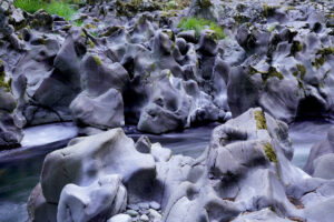 Canyon walls have been scultpted into wicked, grotesque shapes and pockets by East Fork Lewis River.