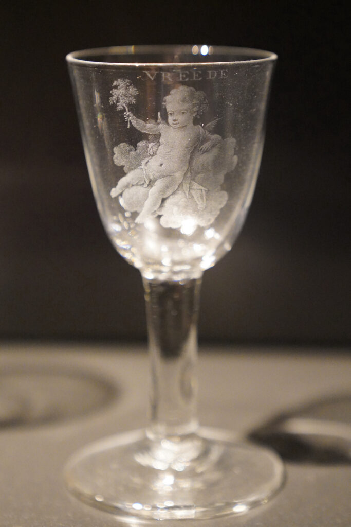 A cherub is pictured on a 17th-century etched crystal goblet at Rijksmuseum.