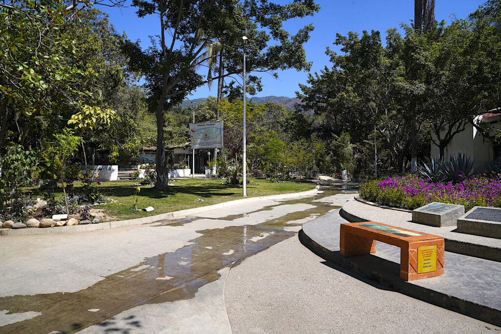 The park on the upstream end of Isla Cuale in Puerto Vallarta on a sunny day.