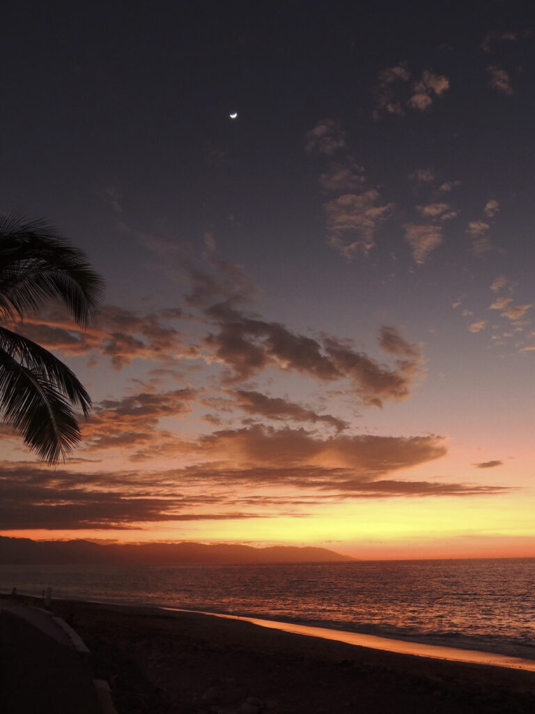 A tropical sunset on the beach at Puerto Vallarta.