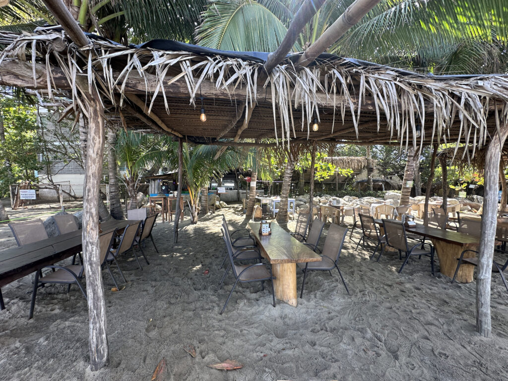 Empty tables at Bar Isla on the beach in Sayulita.