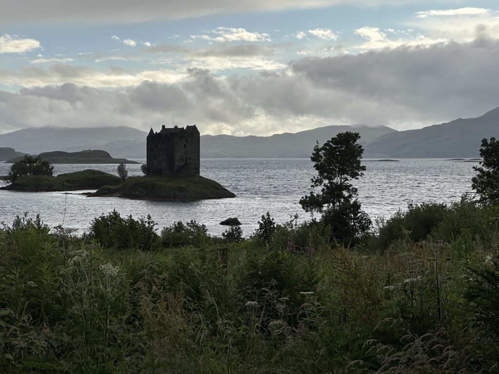 Castle Stalker sits out on an island in a Scottish loch.