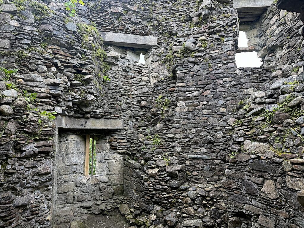 Inside the stone ruins of what was once the kitchen of Dunstaffnage Castle in Scotland.