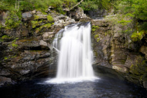 The Falls of Falloch drop thirty feet into a large pool.