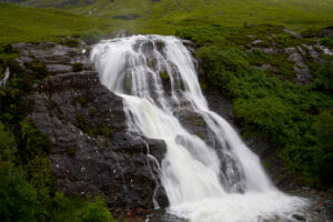 The waterfall at Meeting of Three Waters in Glen Coe, Scotland.