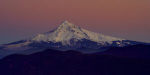 A rose pink dusk settles on Mt Hood, Oregon.