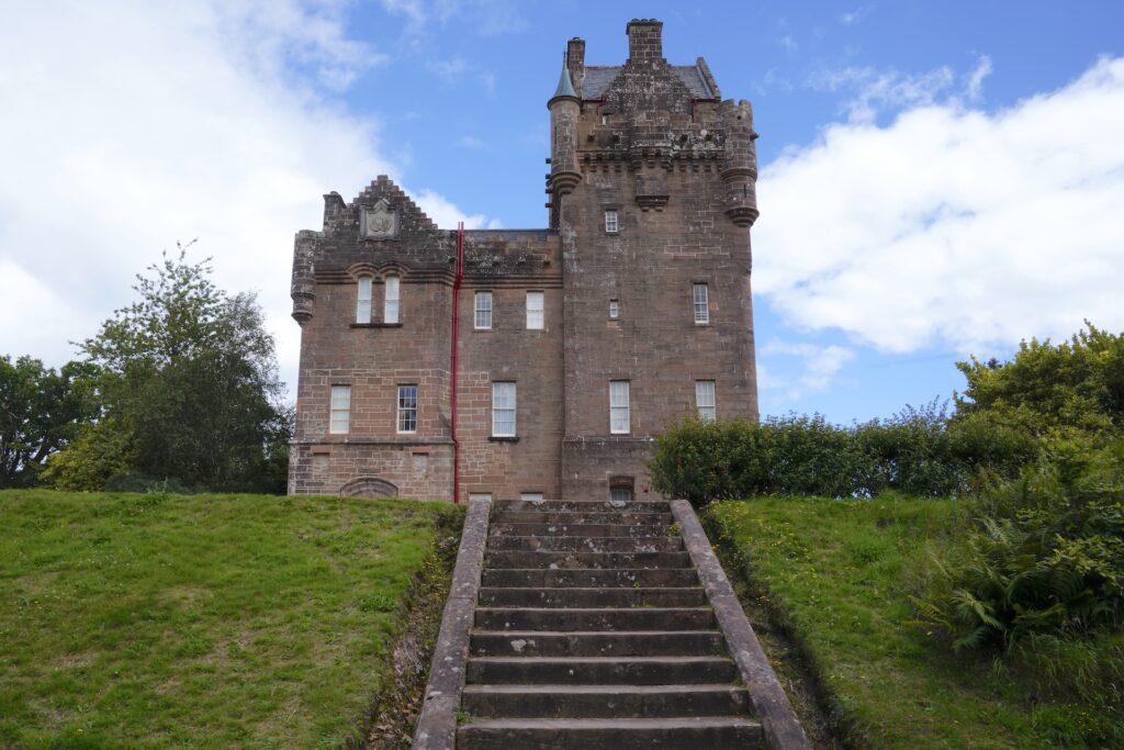 Looking up a set of stairs to Brodick Castle, Scotland.