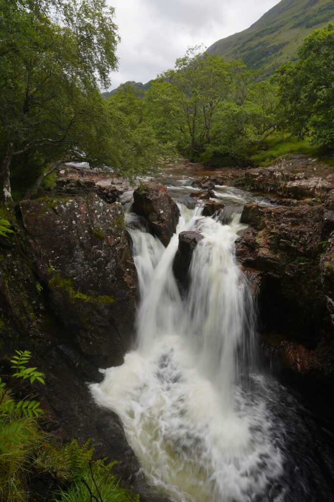 Lower Steall Falls drops about thirty feel into a frothy pool in Scotland's beautiful Glen Nevis.