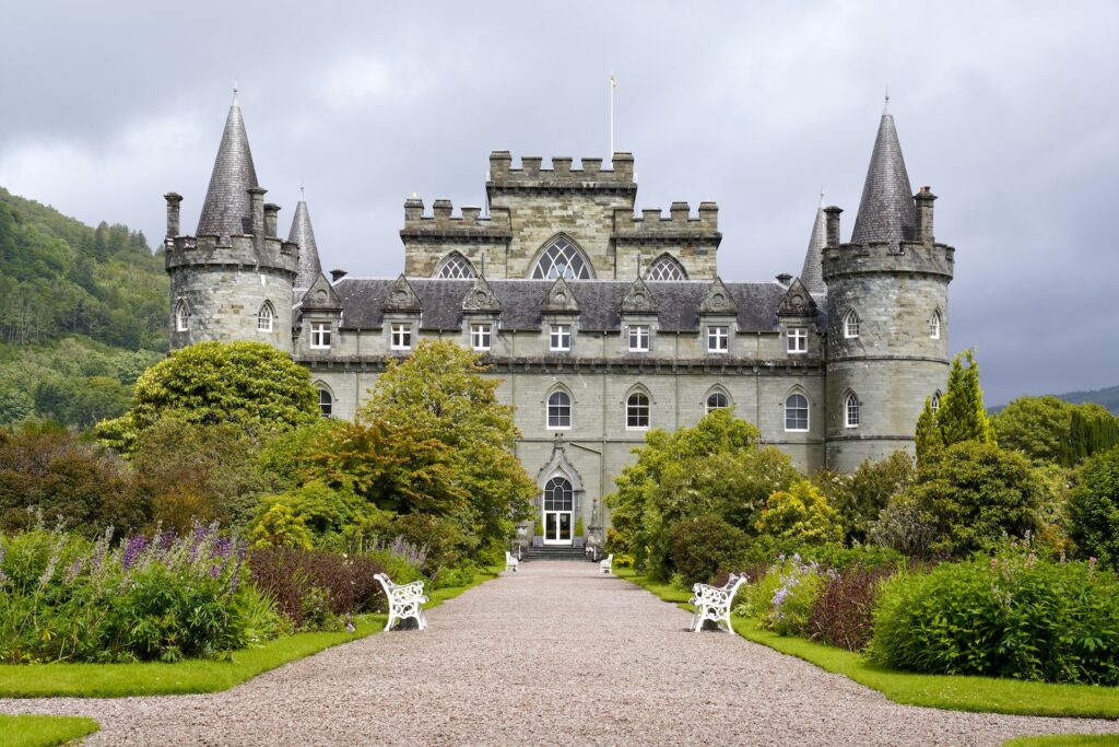 Inveraray Castle in Scotland reeks of French Baroque style, including symmetrical turrets and a formal garden.