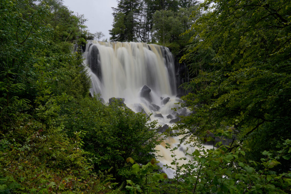 Aros Waterfall on the Isle of Mull in Scotland flows strongly after days of rain.