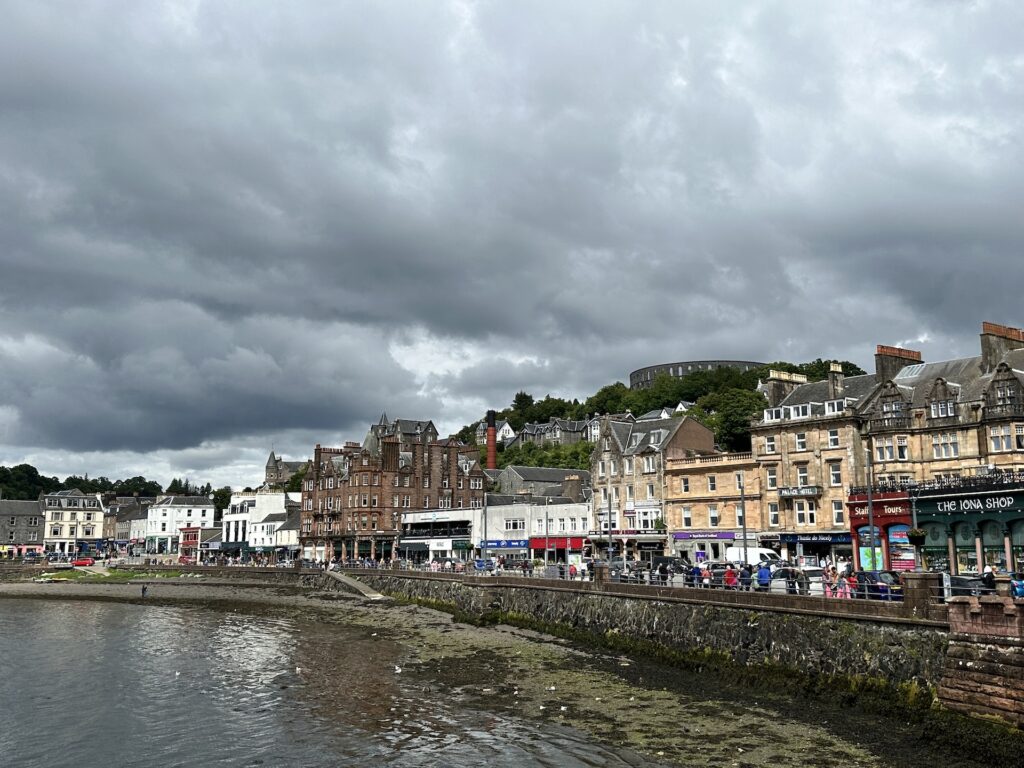 The waterfront village of Oban, Scotland on a cloudy day.