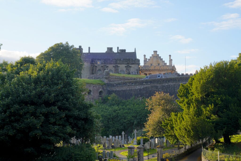 Looking up at Stirling Castle, Scotland, from the graveyard below it.