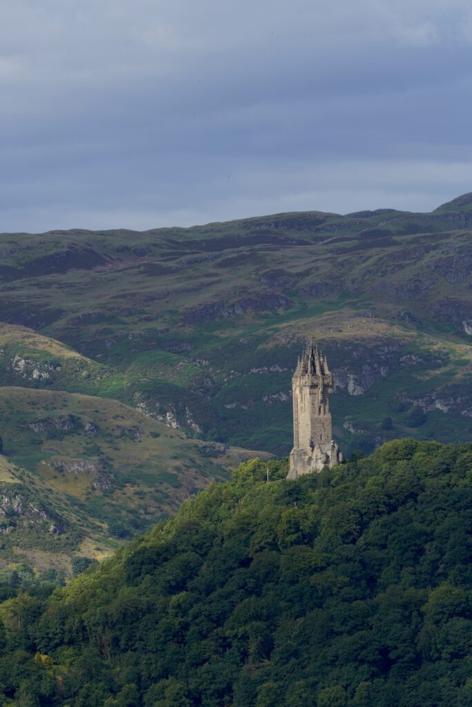 The Wallace Monument rises from a hilltop outside of Stirling, Scotland.